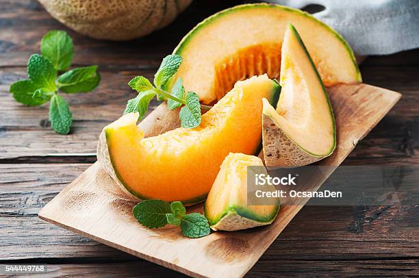 Fresh Sweet Orange Melon And Green Mint Stock Photo - Download Image Now - Cantaloupe, Melon, Summer