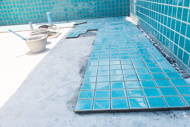 Tile builder swimming pool stock photo