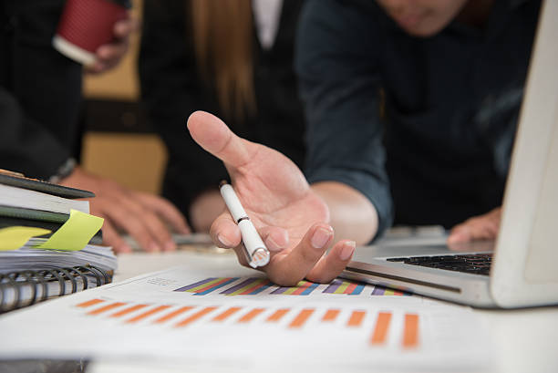 istock business documents on office table with smart phone and laptop 544453170