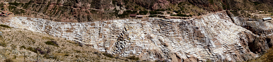 Salt evaporation ponds of Maras, Peru.  Maras is a town in the Sacred Valley of the Incas in the Cuzco Region of Peru. The evaporation ponds have been in use since before Inca times. The salt-evaporation ponds are up-slope, less than a kilometer west of the town.