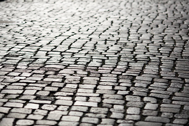 Stone pavement texture in perspective stock photo