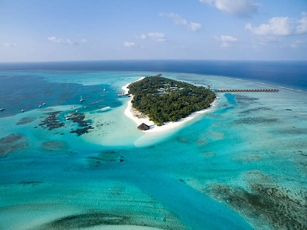 aerial view of a maldivian island Maldives Island from arial view meeru island photos stock pictures, royalty-free photos & images