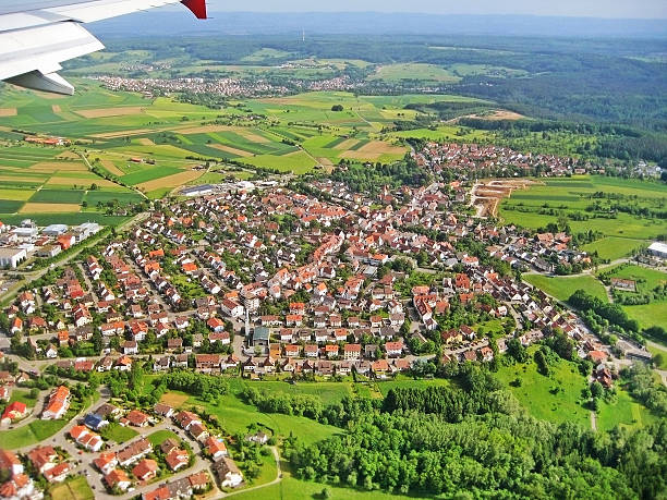 istock Landing approach - Village aerial view 544457912
