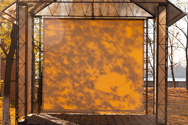 istock shadow of leaves on the wall   gazebo in  fall 544458316