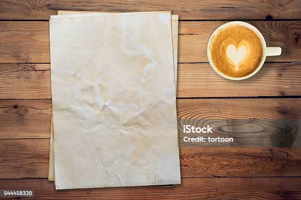 Old Paper And Coffee On Wood Table With Space Stock Photo - Download Image Now - Antique, Blank, Brown