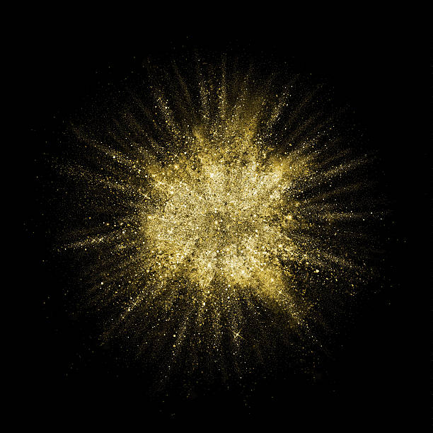 istock Gold glitter powder explosion. Golden color dust splash. 544458540