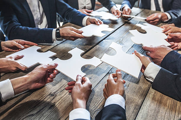 istock Business people and puzzle 544460088