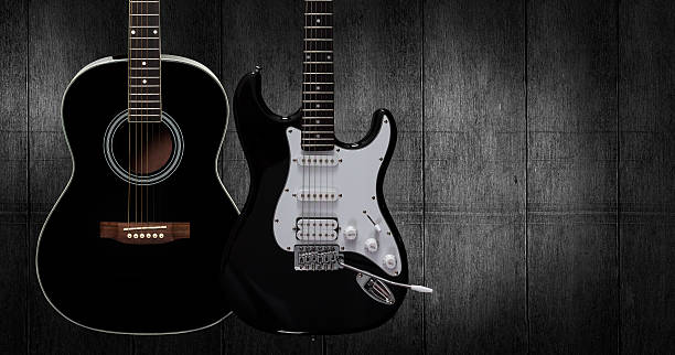 Acoustic and electric guitar. Acoustic and electric guitar on dark black wooden background. acoustic music stock pictures, royalty-free photos & images