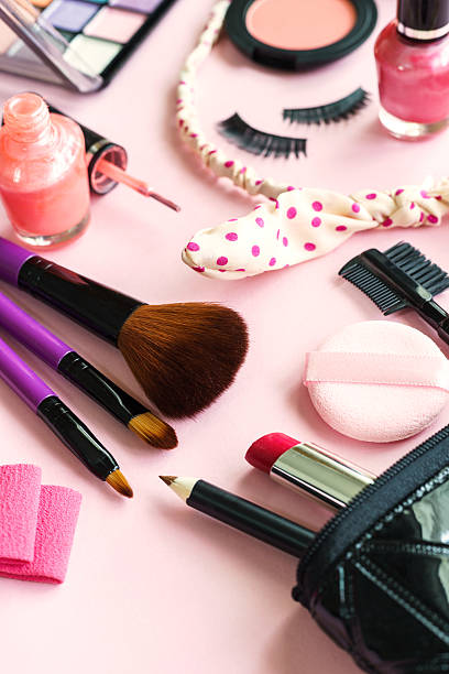 istock various makeup products and cosmetics isolated on pink 544464274