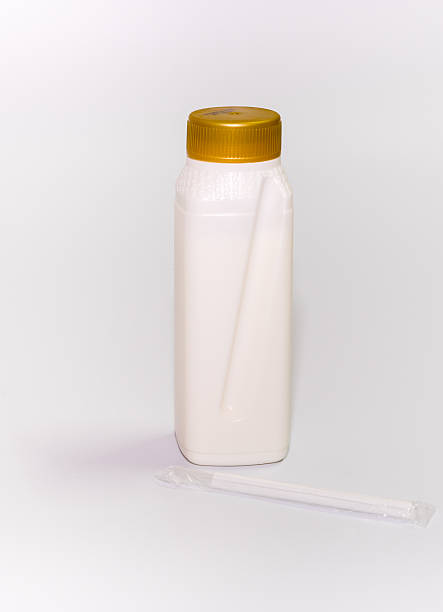 istock milk in plastic bottle with closed cap on white background 544465096