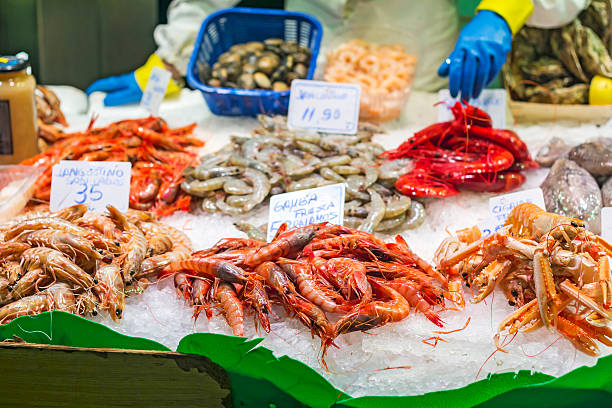 istock Shrimps and prawns in the fish market 544465156