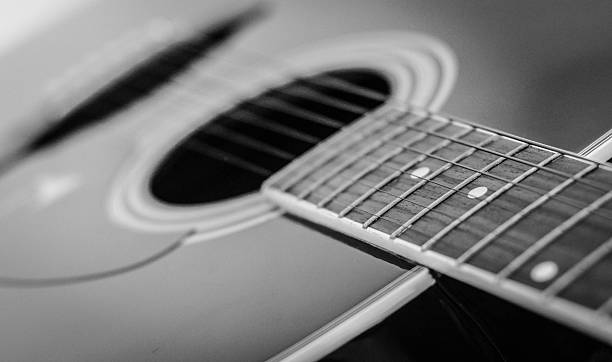 istock Acoustic Guitar Black and White 544465940