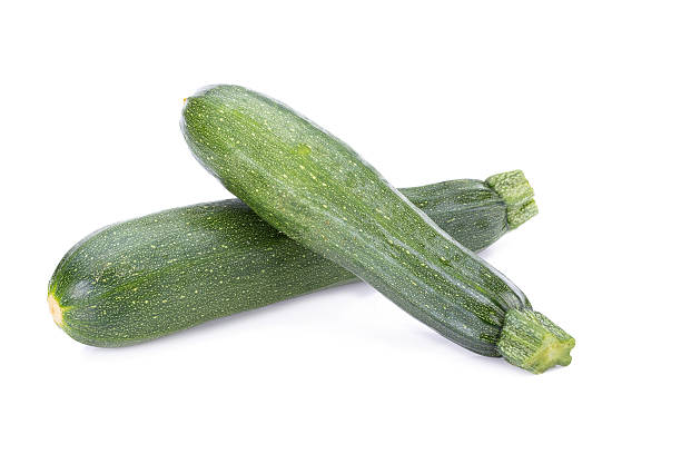 istock green zucchini vegetables isolated on white 544467138