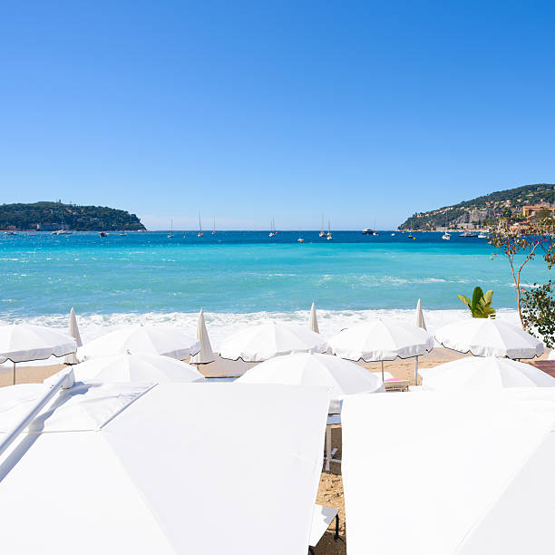 istock French Mediterranean Beach with Sun Beds and Parasols 544467142