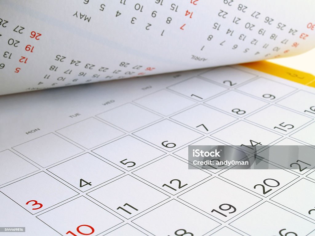 desk calendar with days and dates in July 2016 desk calendar with days and dates in July 2016, flip the calendar page National Holiday Stock Photo