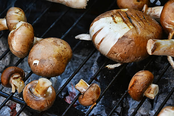 istock Brown mushroom mushrooms on grill 544471128