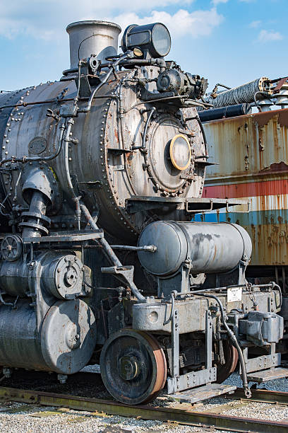 istock old steam engine iron train detail close up 544473506