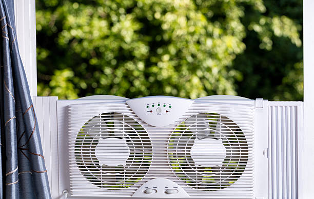 Window fan ready to cool down room