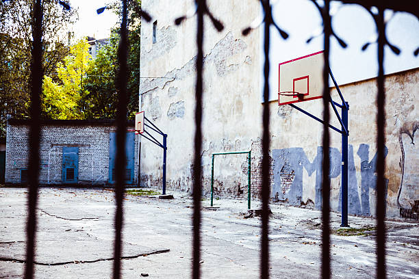 istock abandoned Basketball court backyard 544474504