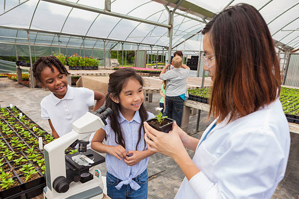istock Happy girls on science field trip 544477948