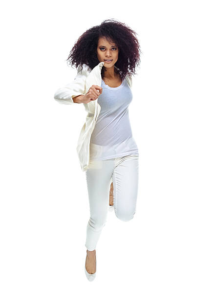 istock Smiling woman jumping 544478096