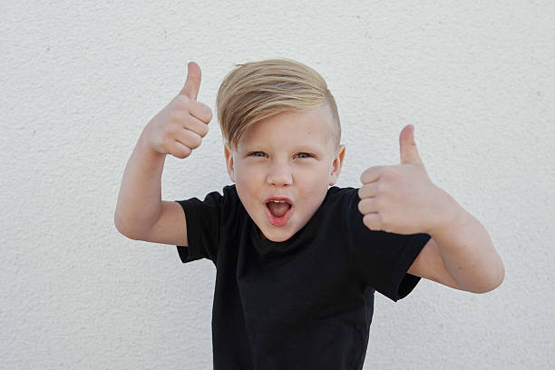 istock young emotional boy on bright background 544478752