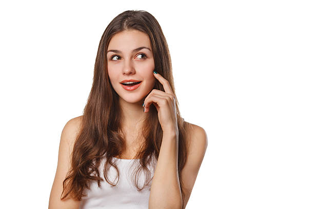 istock Beautiful woman thinking looking to the side at copy space 544483192