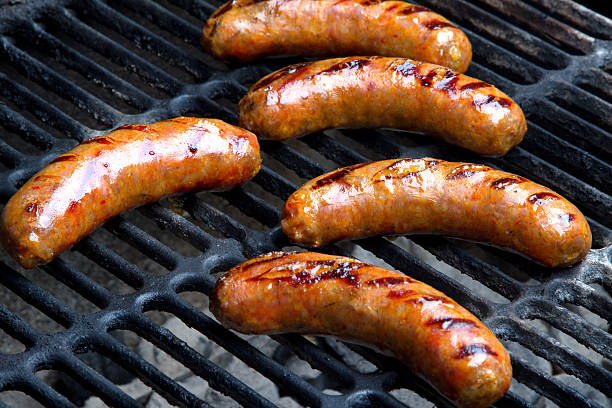 istock Brats Being Grilled Over Hot Coals 544485862