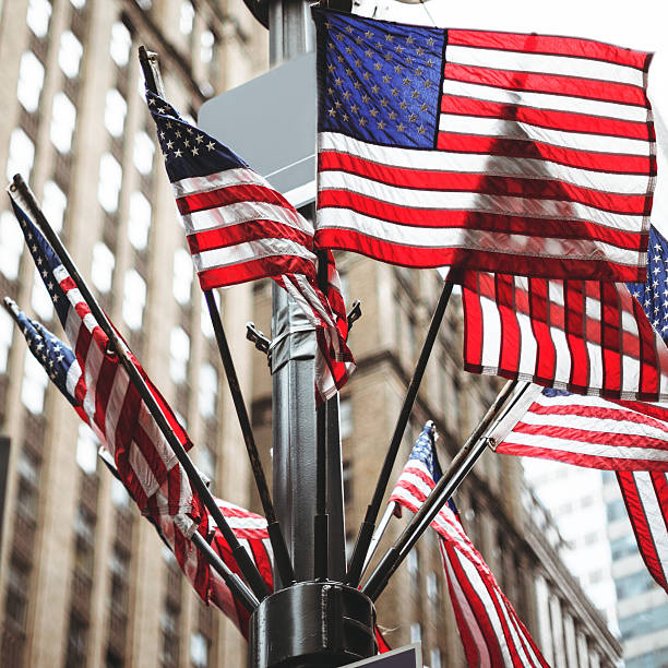 istock us flags waving on manhattan for a national holiday 544485932