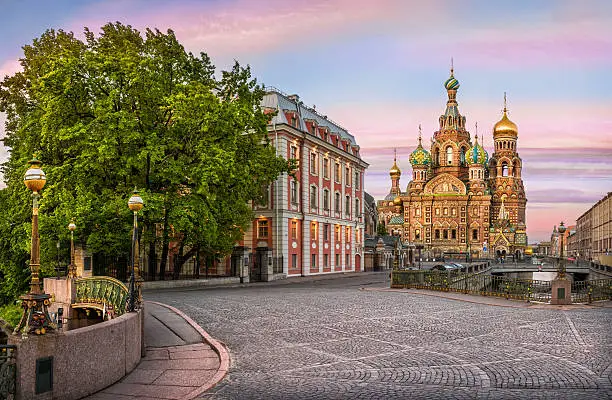 On a cobblestone street near the Cathedral of the Savior on Spilled Blood in a rose morning