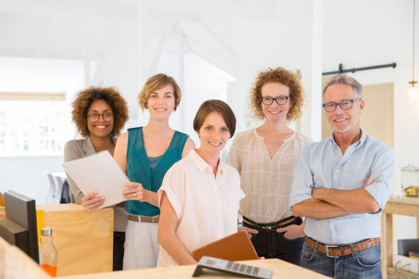 istock Portrait of smiling office workers 544488183