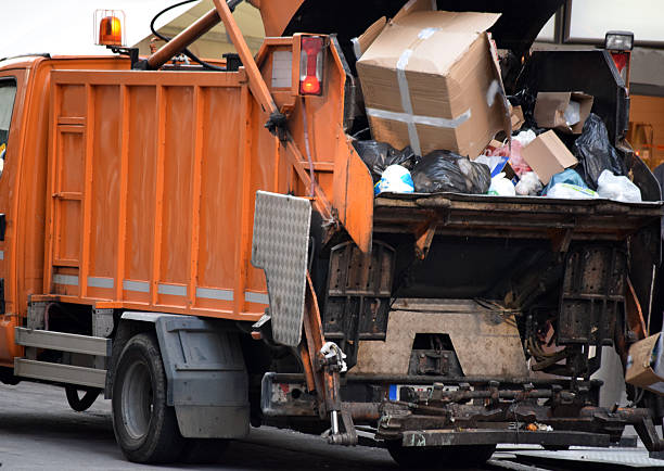 istock garbage trucks on the street 544488866