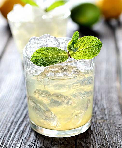 istock Lemonade in a glass with ice, mint, lime 544489702