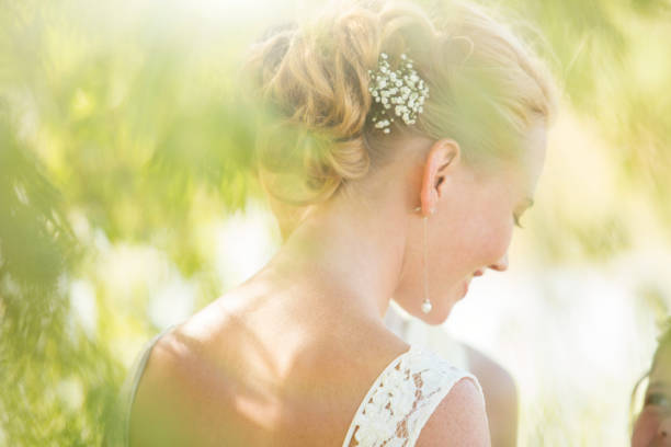 istock Bride standing in domestic garden 544490639