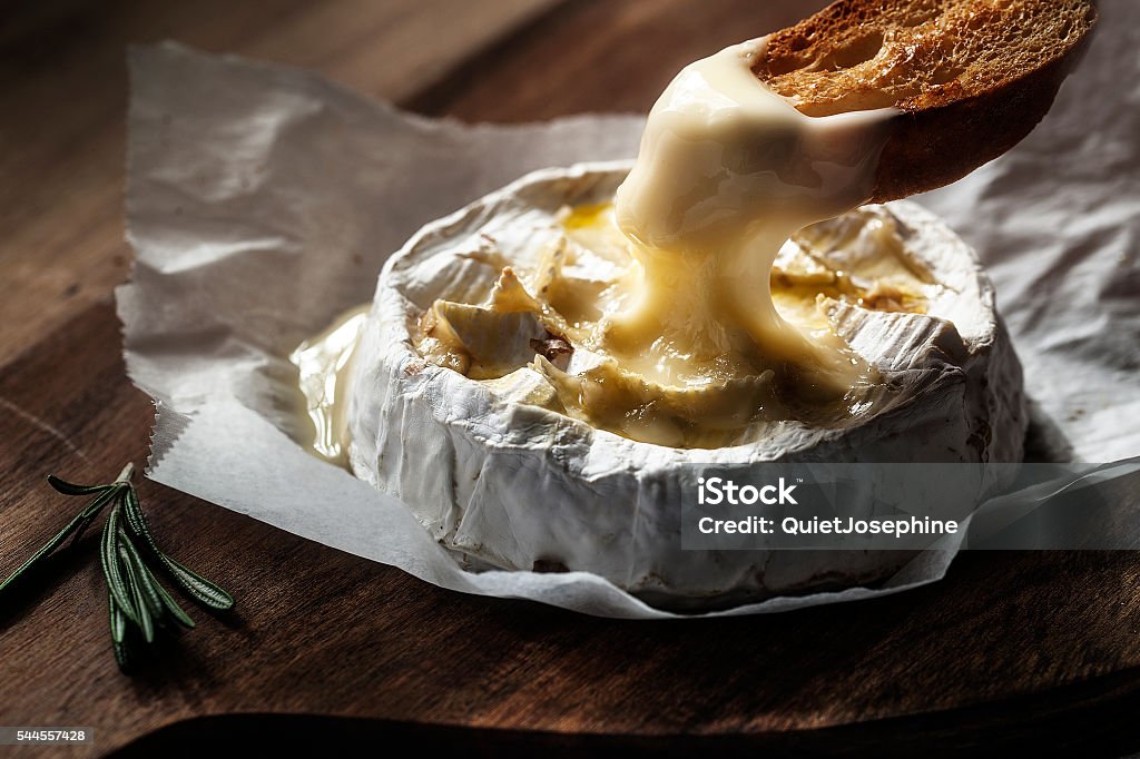 Baked camembert with toast and rosemary Camembert Stock Photo