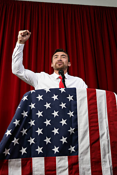 istock Politician Raising Fist Vertical 544560450