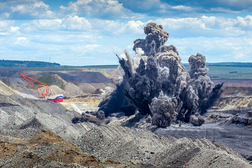Explosive works on a coal mine open pit