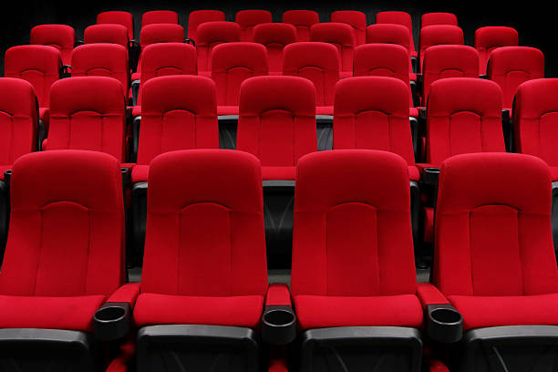 istock Empty theater auditorium or cinema with red seats 544566802