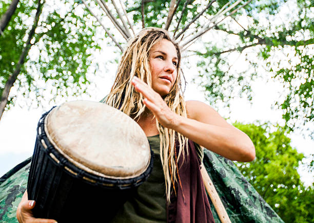 istock Woman Playing Djembe Drum 544567926