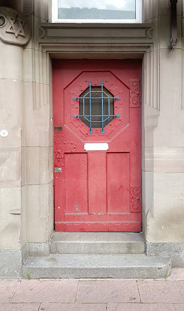 istock Vintage red door on the rustic wall 544568030