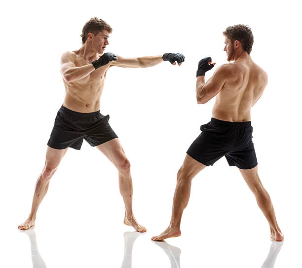istock Mixed martial arts fighters fighting 544569550