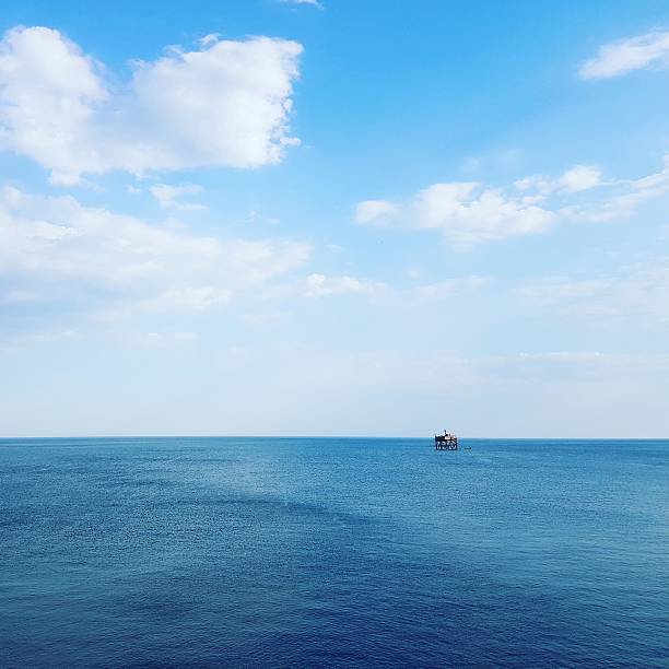 istock oil platform in the sea 544573020