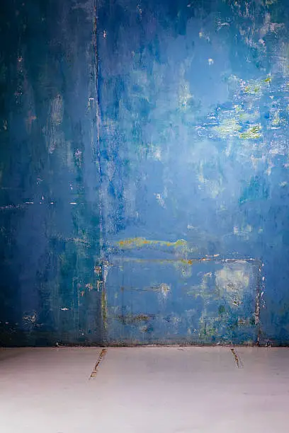 Photo of Empty grunge room with floor and concrete wall