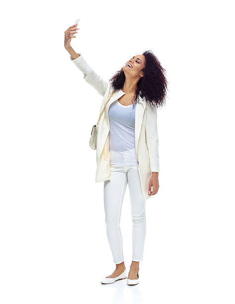 istock Smiling woman taking a selfie 544589864