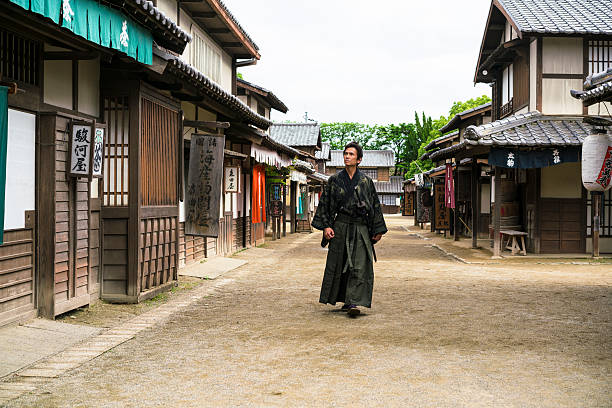 istock Samurai warrior with Sword on an old street in Japan 544590058
