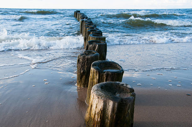 istock Breakwater on sea and blue sky 544590718