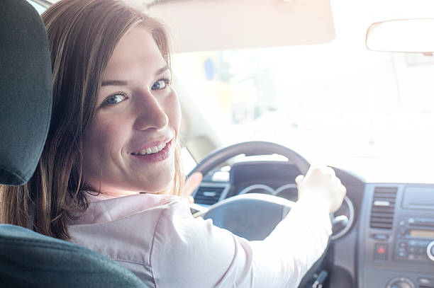 istock Young pretty woman in car 544591672