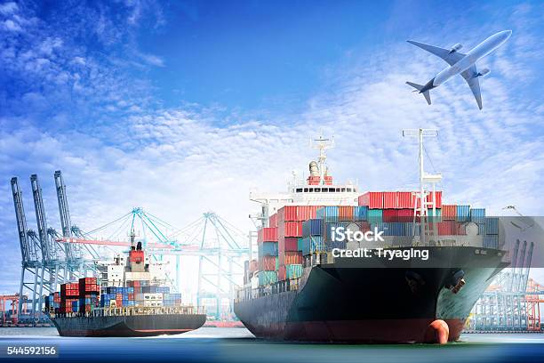 Container Cargo Ship And Cargo Plane With Working Crane Stock Photo - Download Image Now