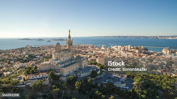 High Angle View Of Cityscape By Sea Against Sky Stock Photo - Download Image Now - Marseille, France, Cityscape