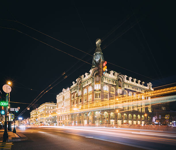Night view of Saint Petersburg with traffic and light trails.